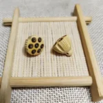 Boxwood Ebony Lotus Charm