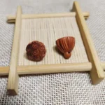 Boxwood Ebony Lotus Charm