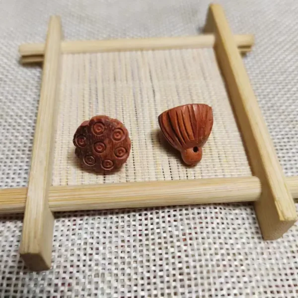 Boxwood Ebony Lotus Charm