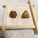 Boxwood Ebony Lotus Charm