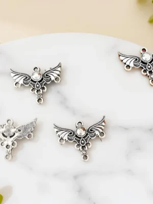 Angel pendant in dark silver